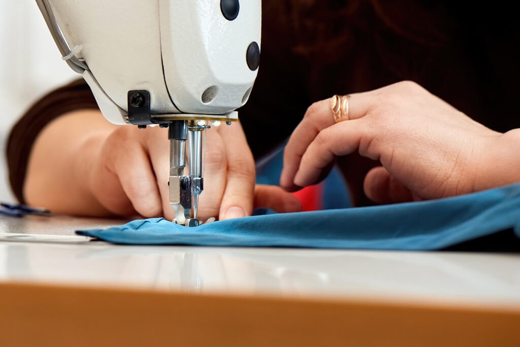 woman working on a sewing machine
