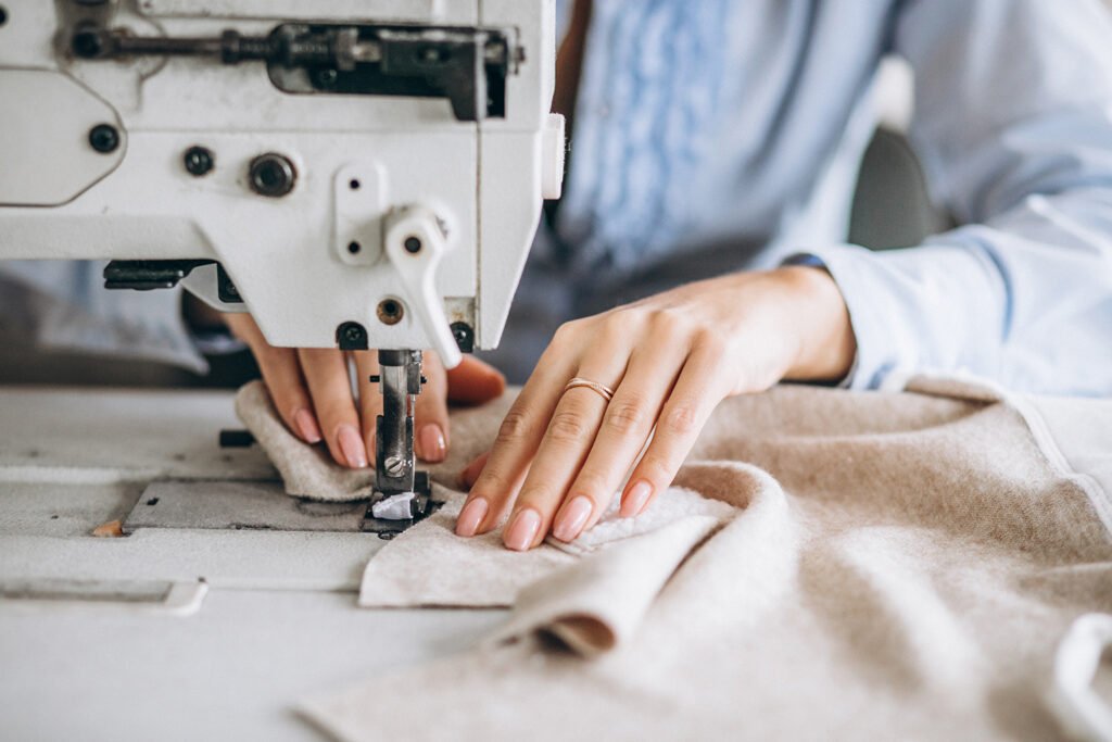woman tailor working at the sewing factory